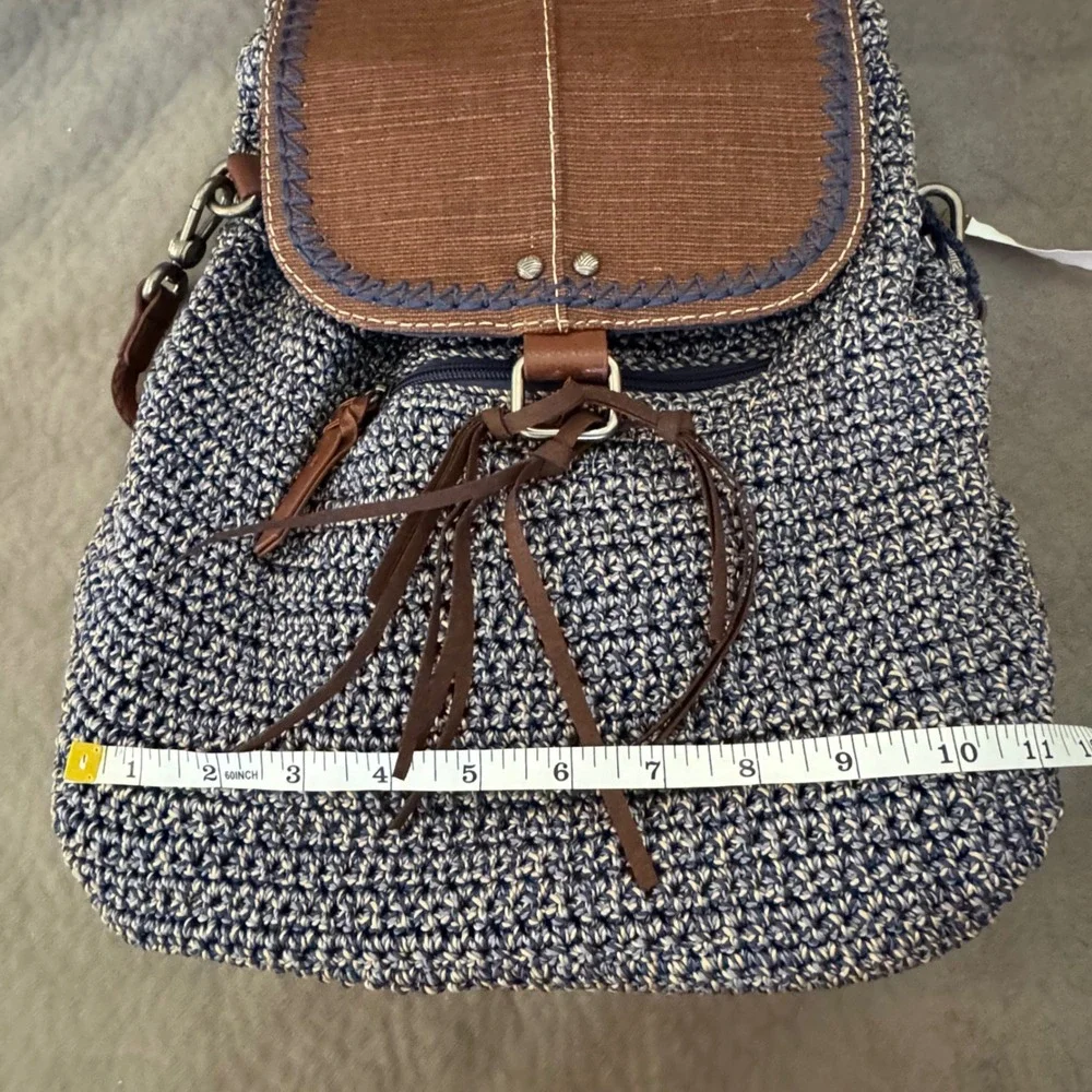 The Sak Brown & Navy Woven Backpack with Tassel Fringe and Embroidered Strap